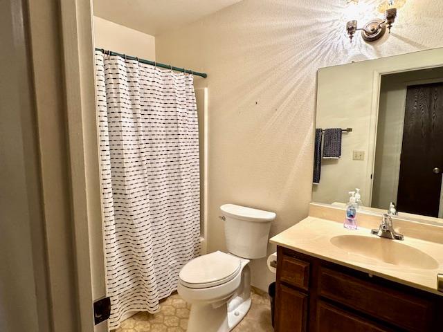 18288 Mountaintop Lane Grass Valley, CA 95949 - Photo 38 of 40 a bathroom with a sink a toilet and mirror