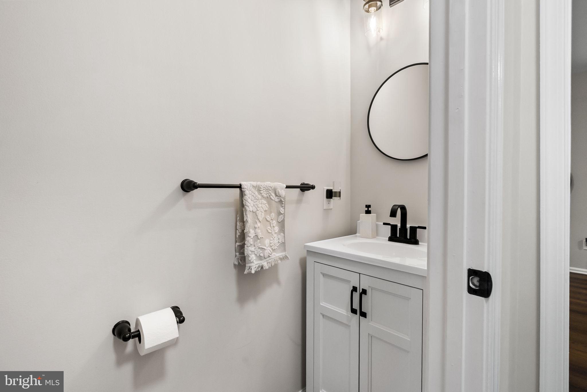 638 Bridge Street Spring City, PA 19475 - Photo 12 of 59 a bathroom with a sink and a mirror