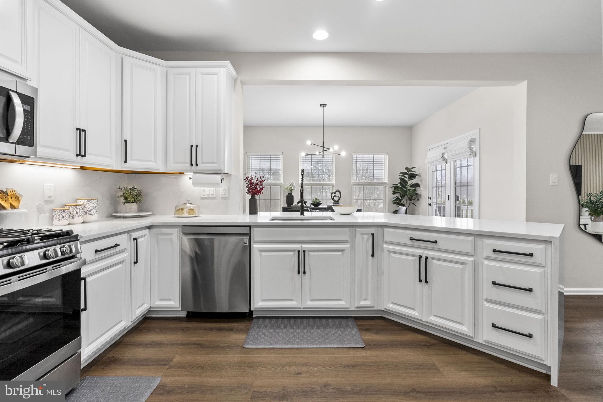 638 Bridge Street Spring City, PA 19475 - Photo 21 of 59 a kitchen with appliances cabinets and a sink