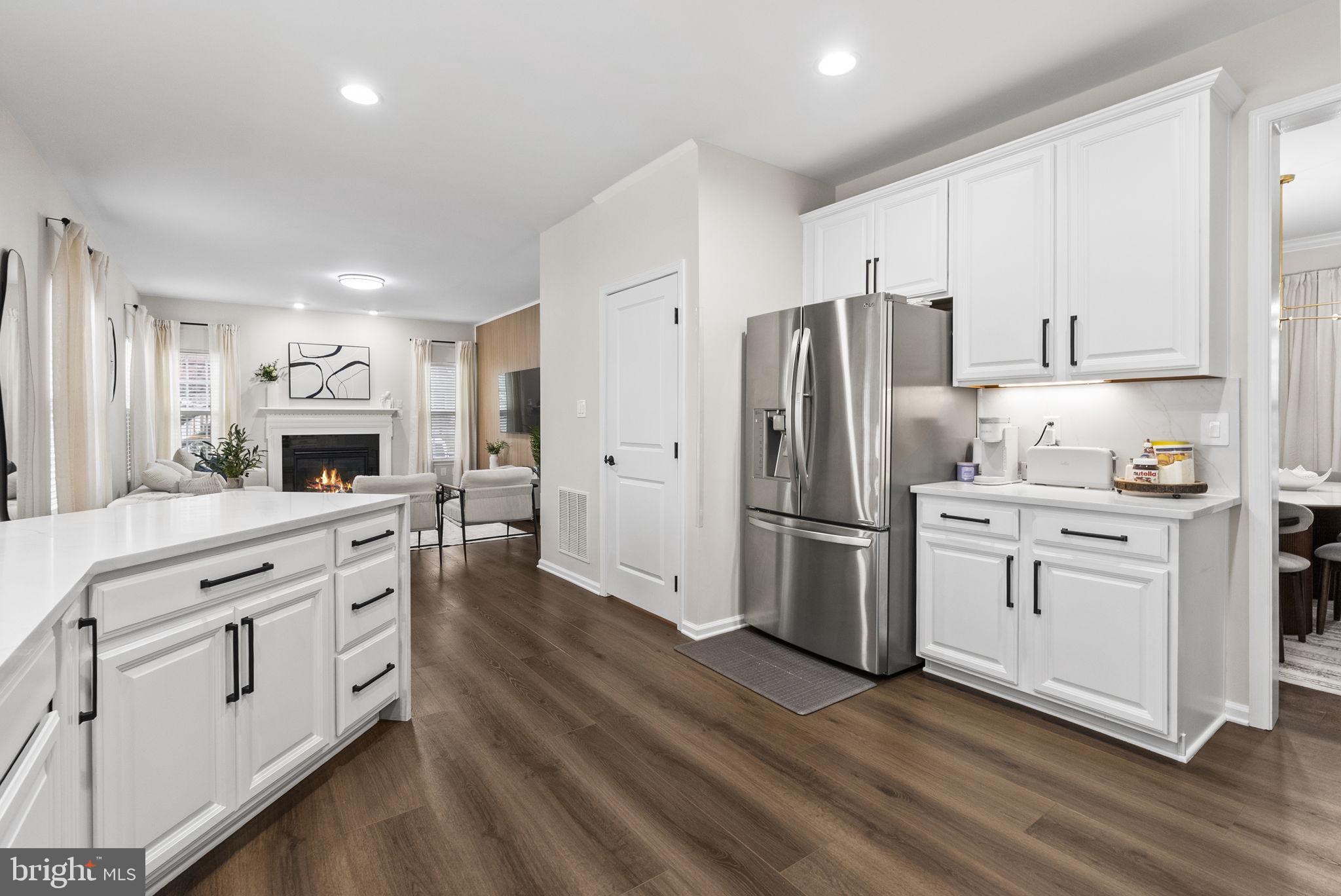 638 Bridge Street Spring City, PA 19475 - Photo 23 of 59 a kitchen with white cabinets and stainless steel appliances