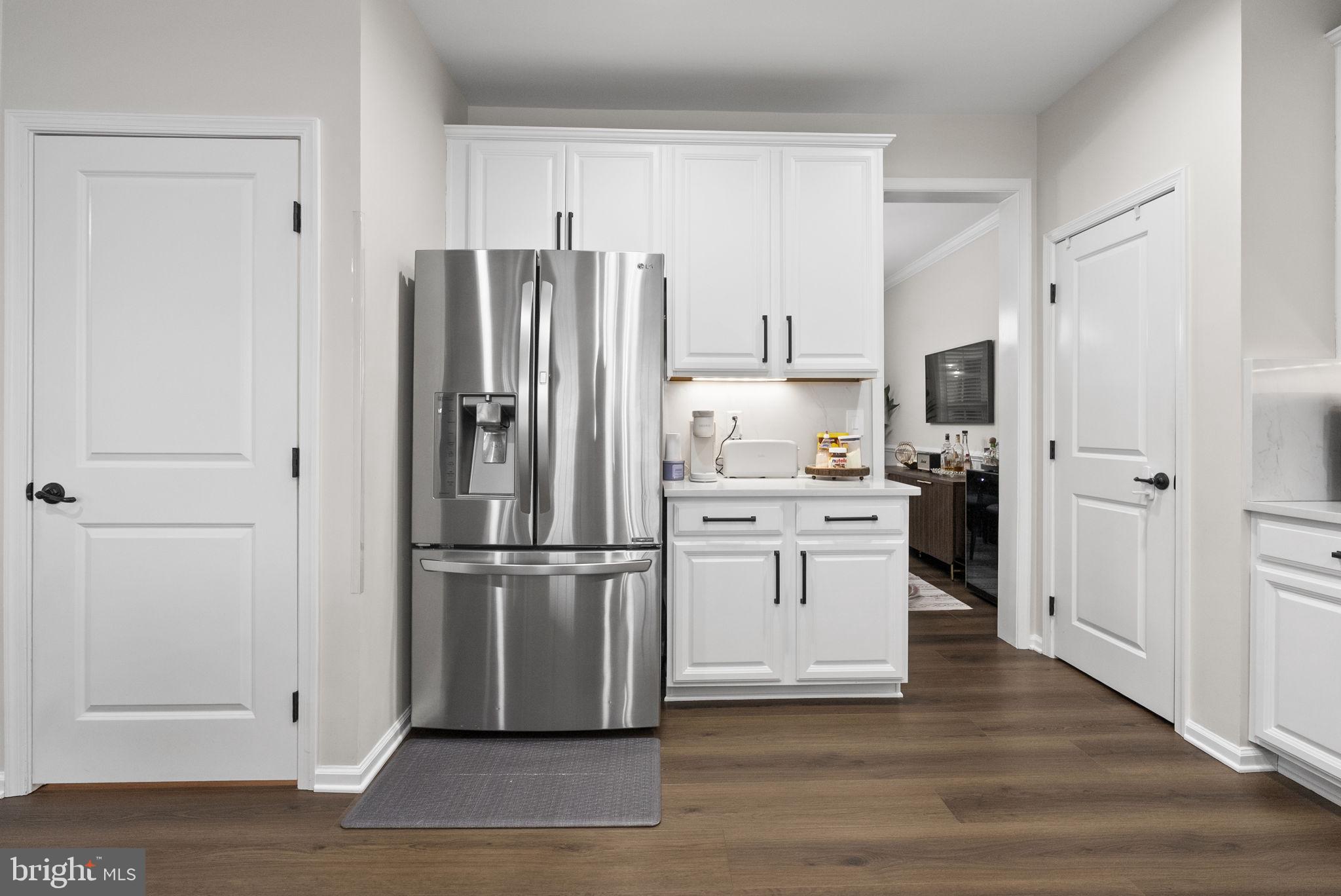 638 Bridge Street Spring City, PA 19475 - Photo 27 of 59 a kitchen with stainless steel appliances a refrigerator sink and cabinets