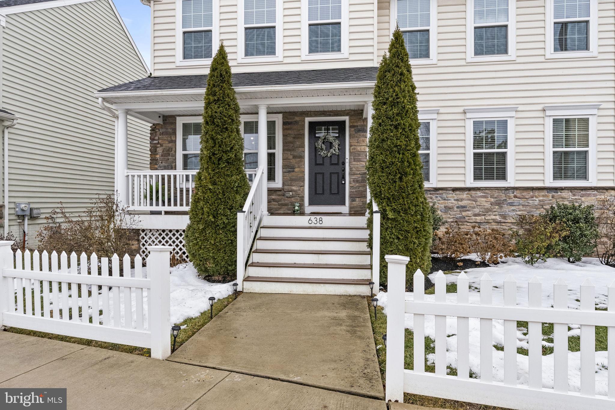 638 Bridge Street Spring City, PA 19475 - Photo 4 of 59 a front view of a house with white fence