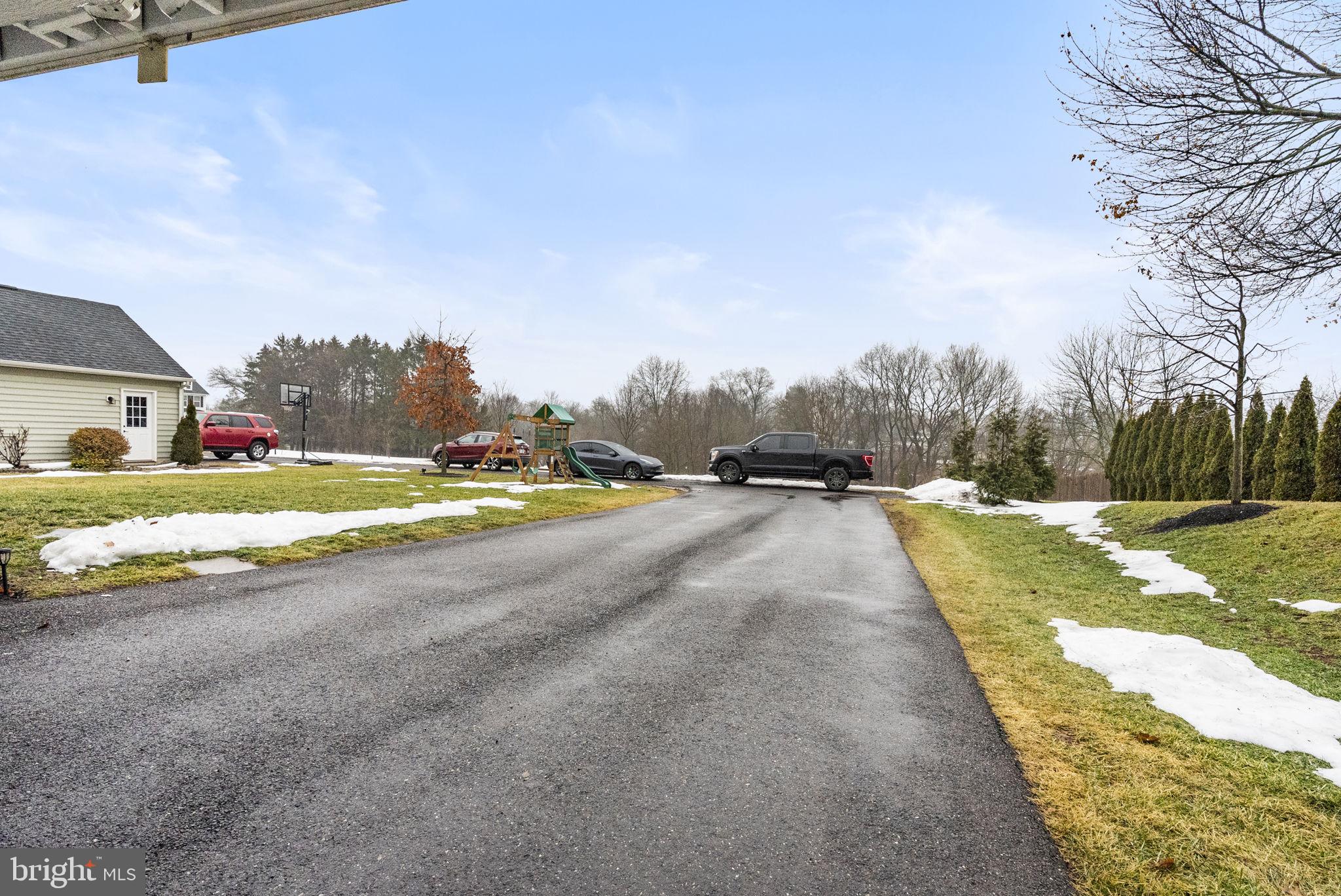 638 Bridge Street Spring City, PA 19475 - Photo 50 of 59 a view of road with grass and trees