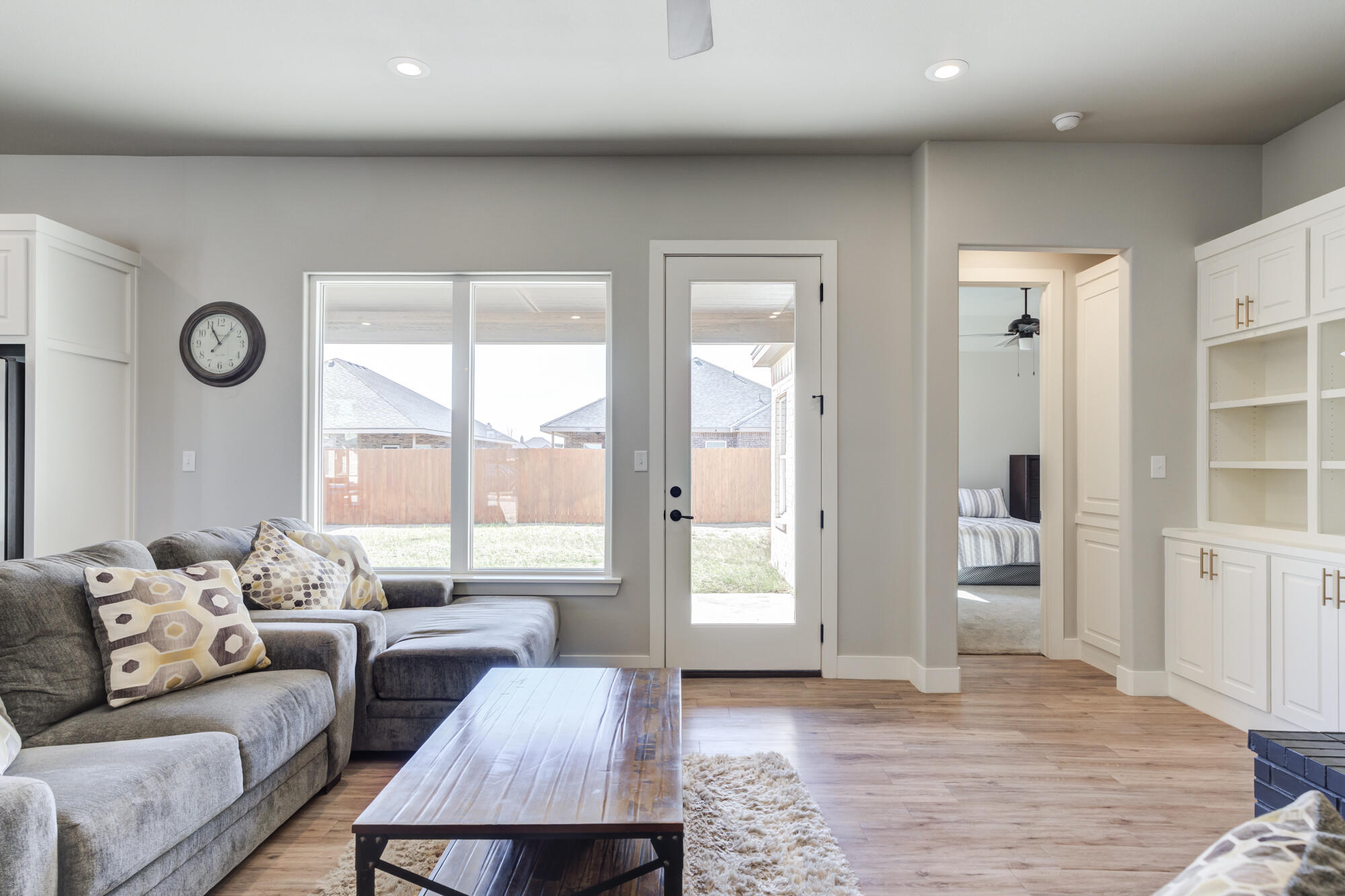 5611 117th Street Lubbock, TX 79424 - Photo 13 of 30 a living room with furniture and a window