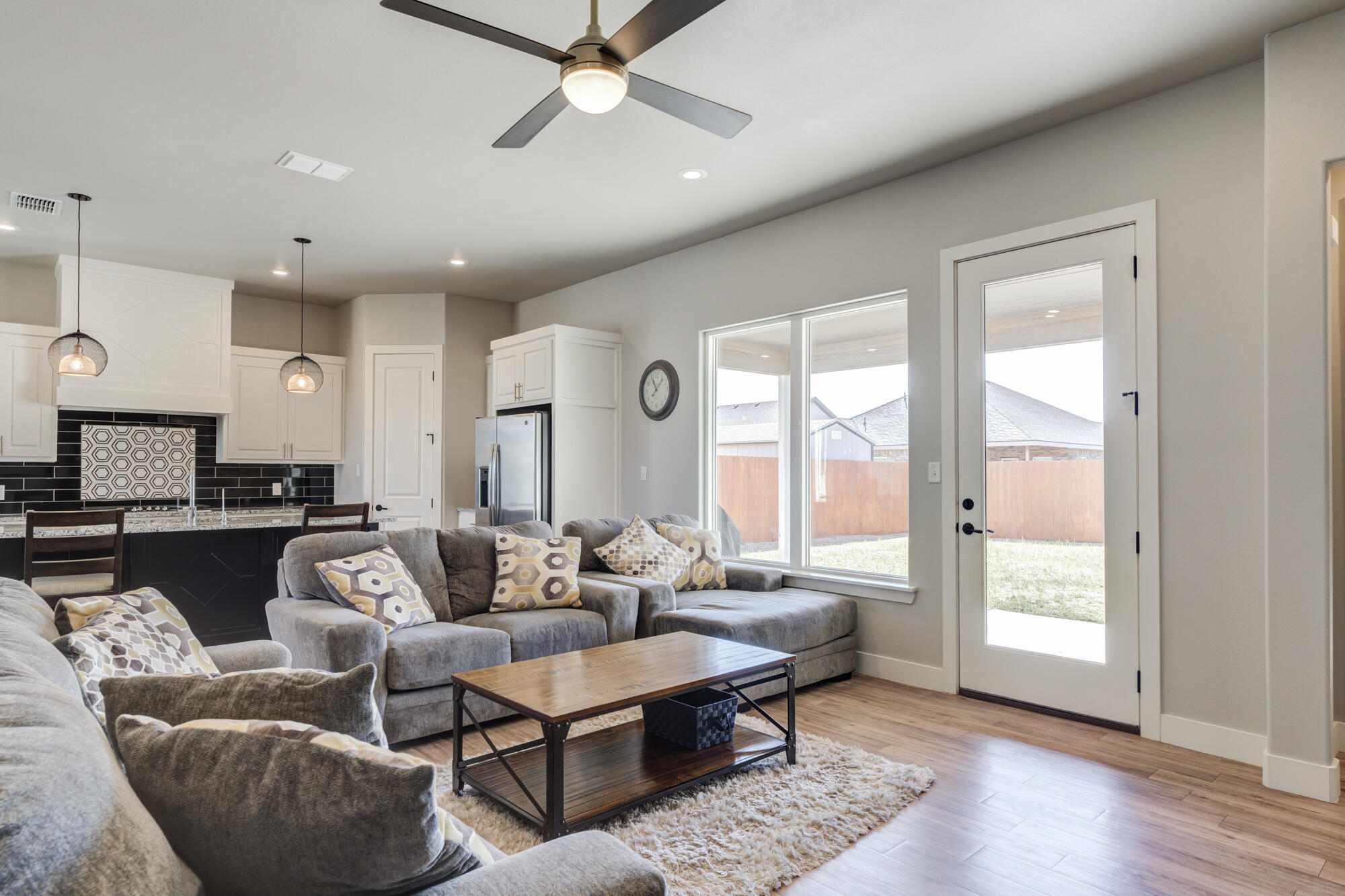 5611 117th Street Lubbock, TX 79424 - Photo 14 of 30 a living room with furniture and a window