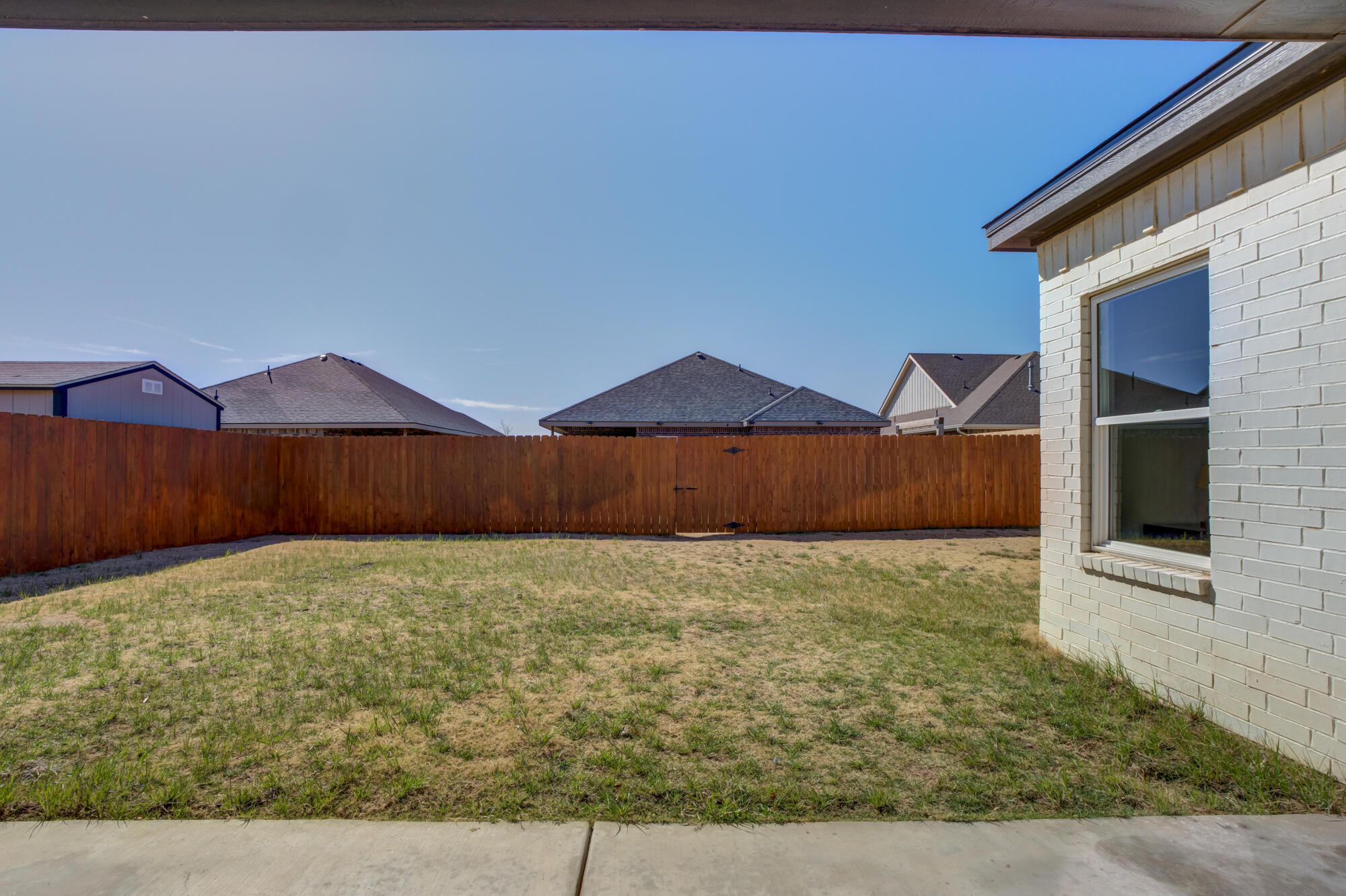 5611 117th Street Lubbock, TX 79424 - Photo 28 of 30 a view of an outdoor space and tv