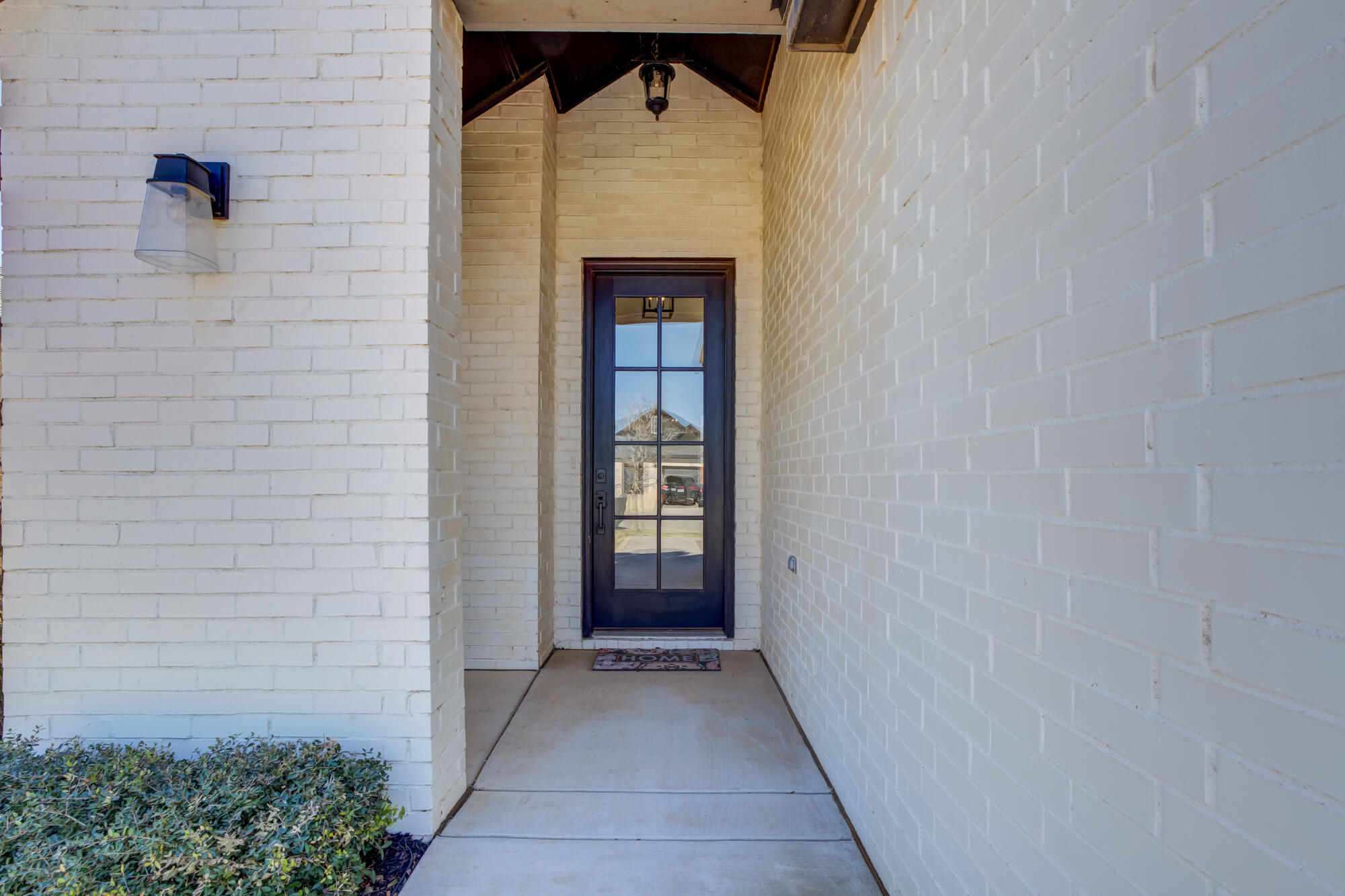5611 117th Street Lubbock, TX 79424 - Photo 3 of 30 a view of an entryway of a house
