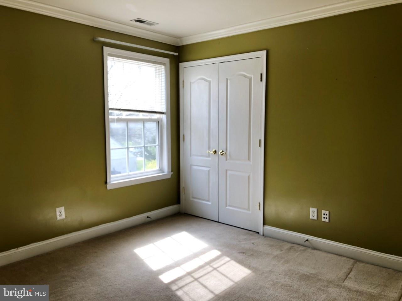 6602 Aaron Mee Way Baltimore, MD 21237 - Photo 23 of 30 an empty room with windows