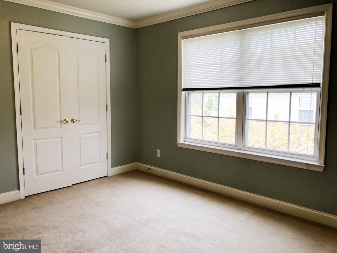 6602 Aaron Mee Way Baltimore, MD 21237 - Photo 27 of 30 an empty room with windows