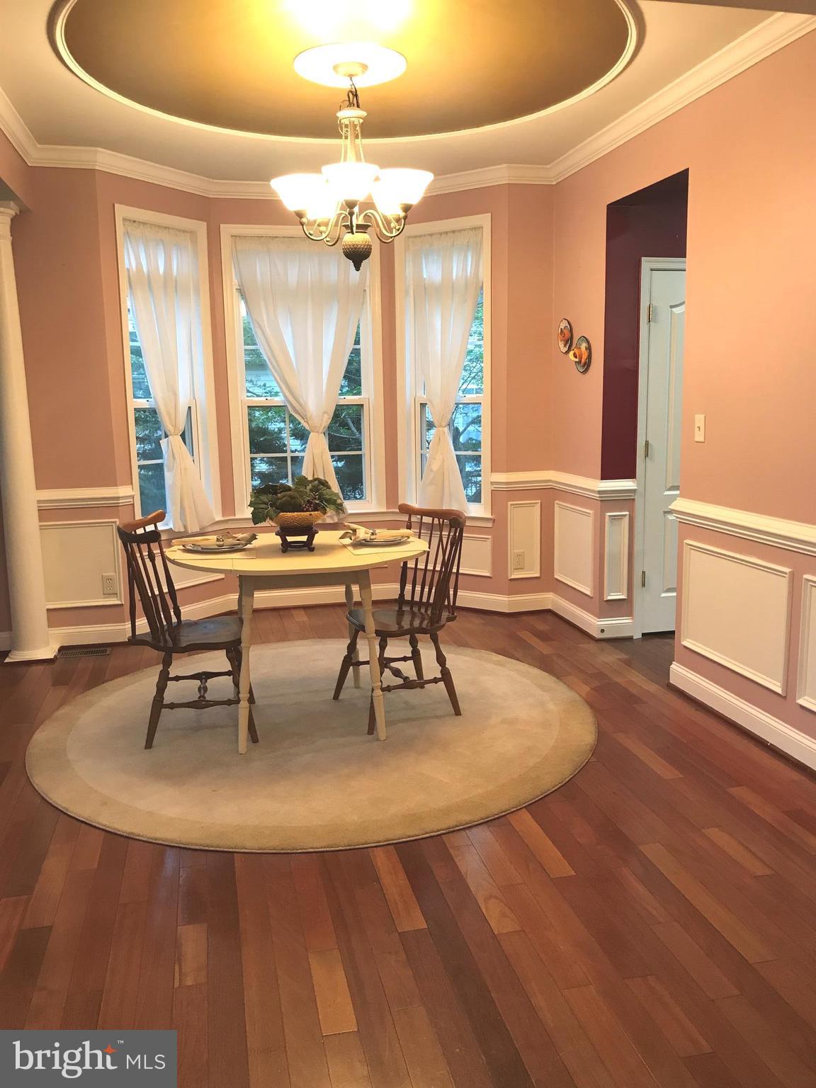 6602 Aaron Mee Way Baltimore, MD 21237 - Photo 6 of 30 a living room with fireplace furniture and a large window