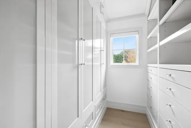 a bathroom with a shower and a sink