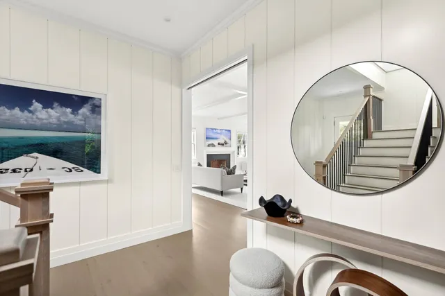 a bathroom with a sink a mirror and a toilet