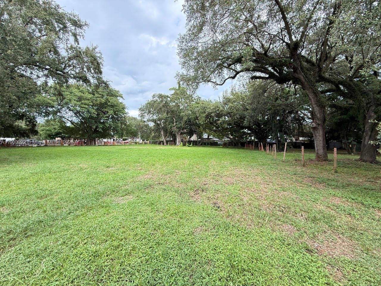 2810 Northwest 14th Street Miami, FL 33125 - Photo 4 of 16 a view of a field with trees in the background