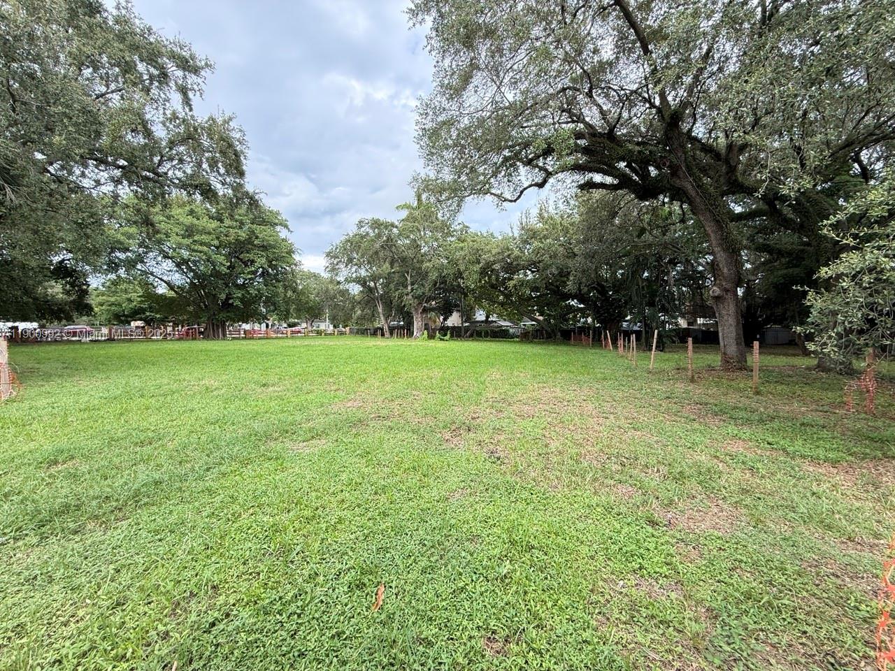 2810 Northwest 14th Street Miami, FL 33125 - Photo 7 of 16 a view of a green field with trees in the background