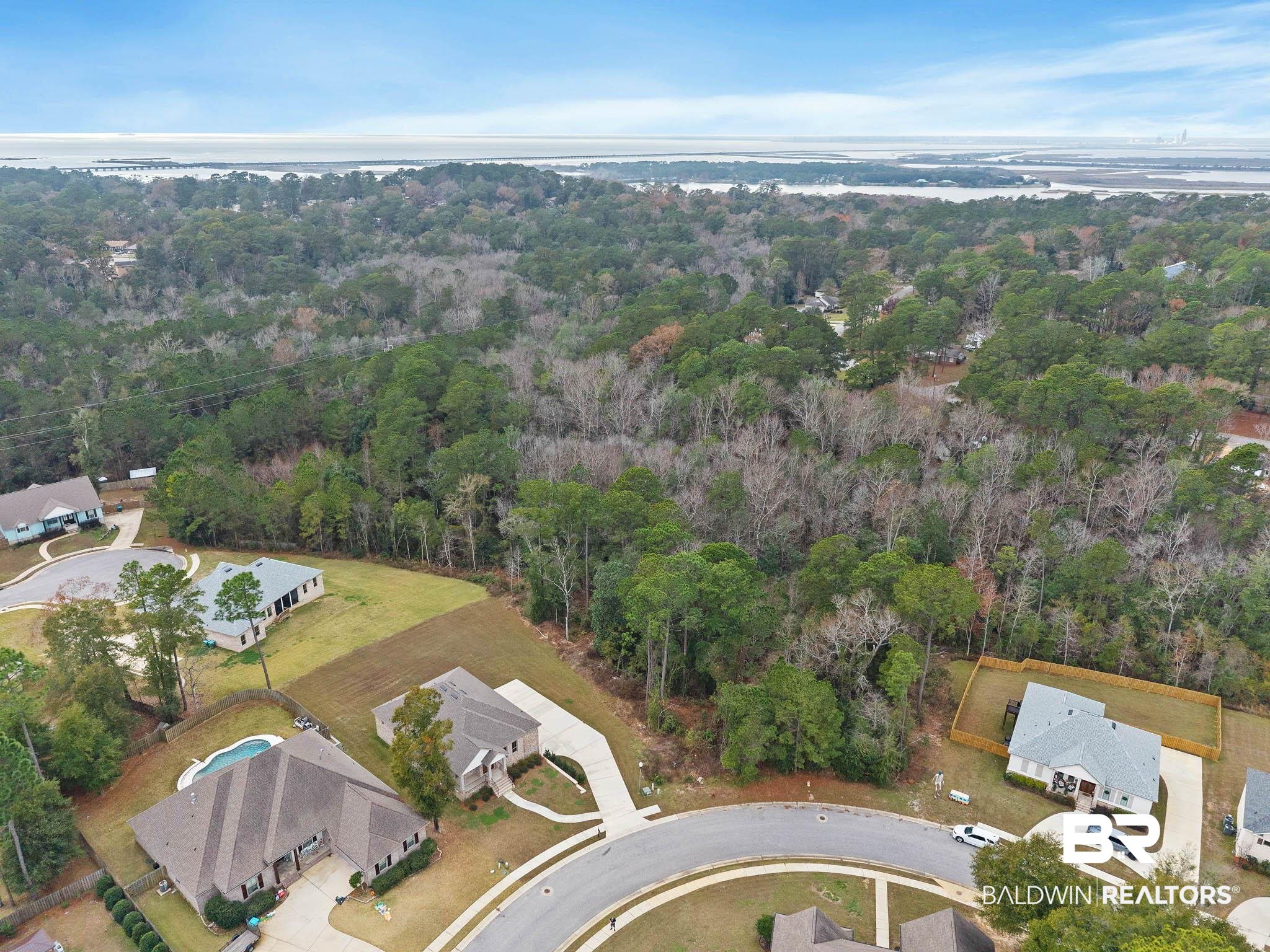 6656 Garrison Drive Daphne, AL 36527 - Photo 52 of 57 View of property location with a heavily wooded area
