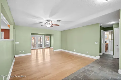 a kitchen with stainless steel appliances granite countertop a stove and cabinets