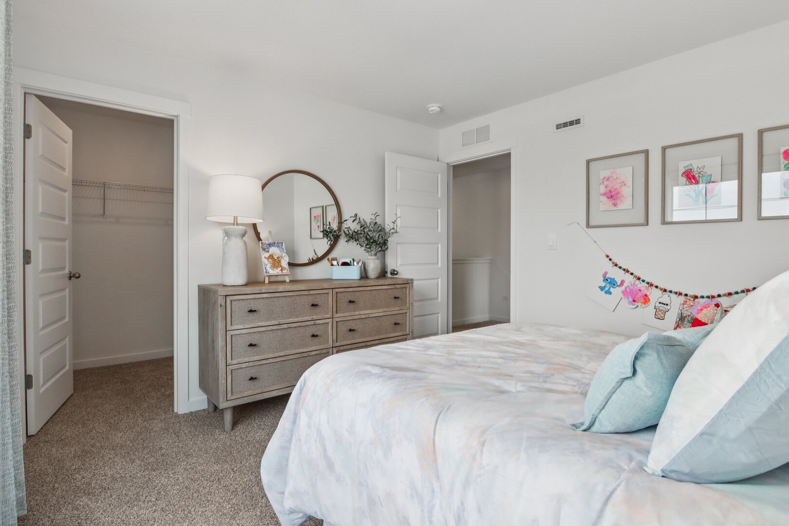 285 Snowdrop Lane Elgin, IL 60124 - Photo 28 of 44 a bedroom with a bed and a dresser