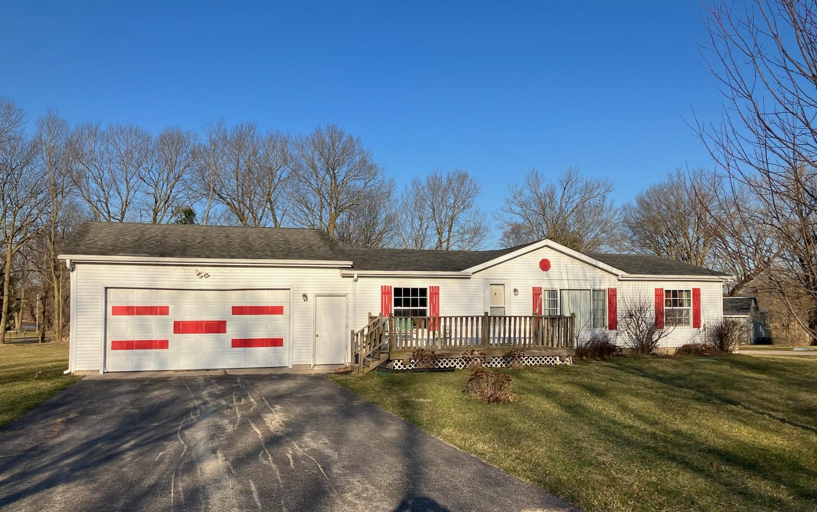 7300 South Rock Nation Road Dixon, IL 61021 - Photo 1 of 24 a view of a house with a yard and tree s