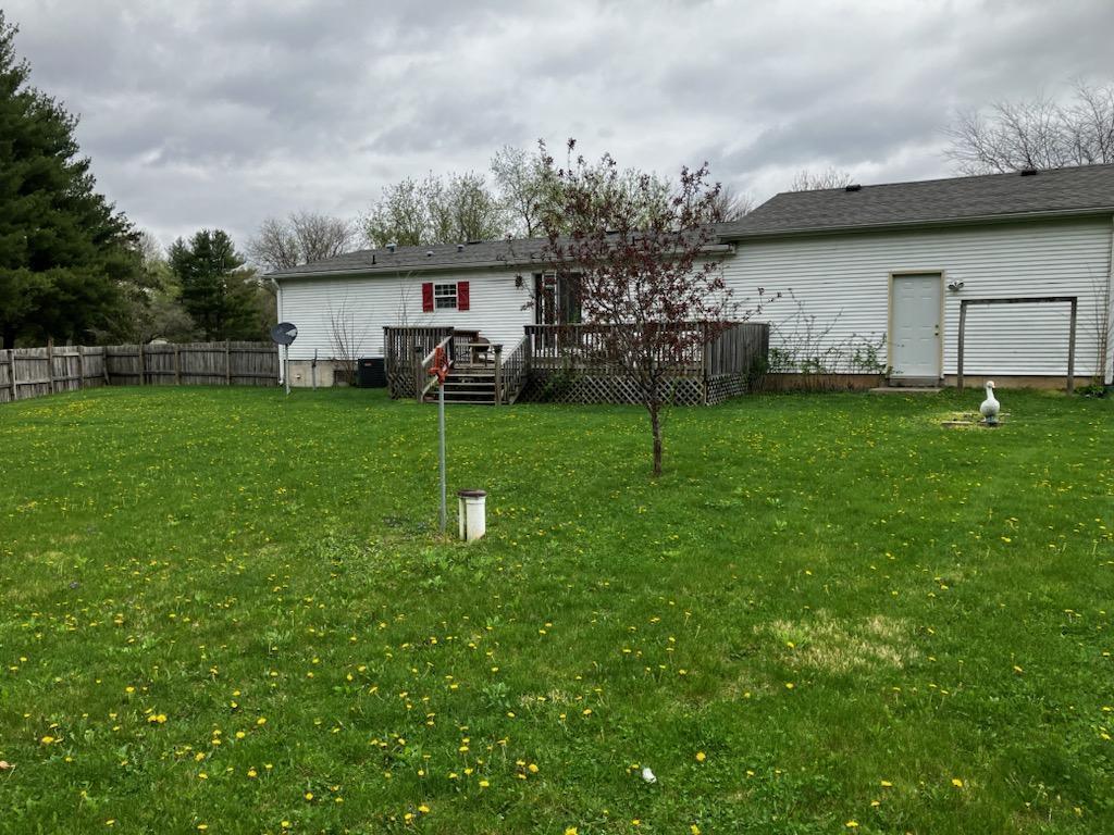 7300 South Rock Nation Road Dixon, IL 61021 - Photo 20 of 24 a view of a house with backyard