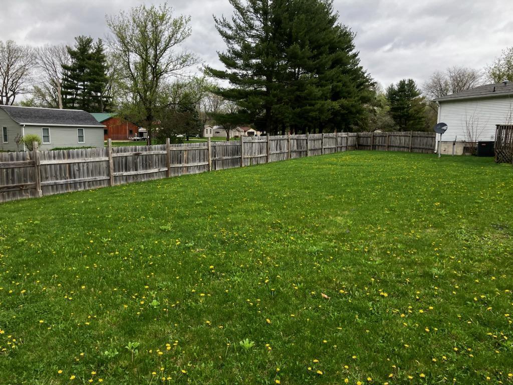 7300 South Rock Nation Road Dixon, IL 61021 - Photo 22 of 24 a view of a house with backyard and sitting area