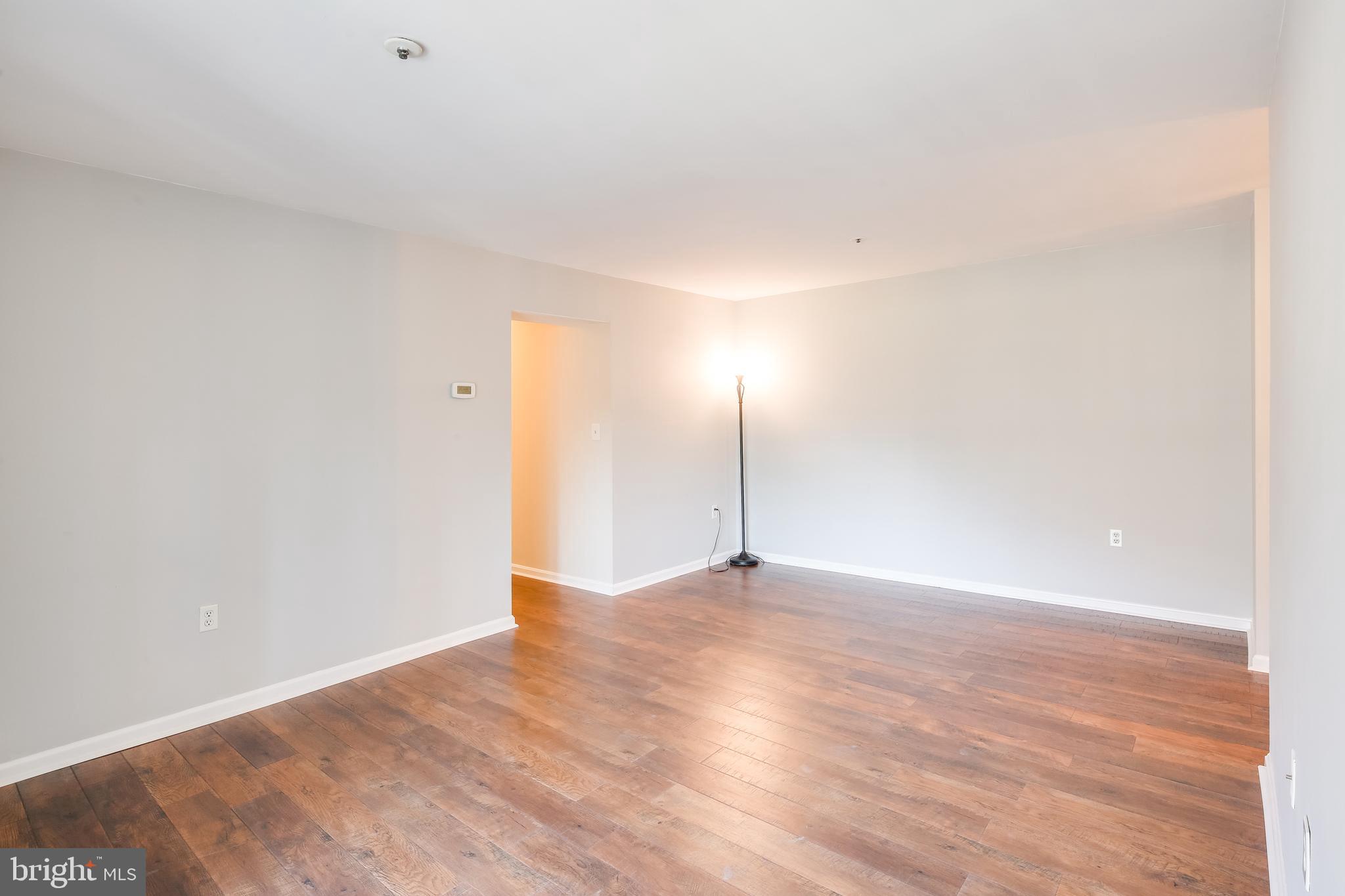 8399 Montgomery Run Road, Unit E Ellicott City, MD 21043 - Photo 14 of 31 Living Room