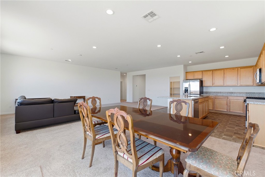 711 Ballesteros Street Perris, CA 92571 - Photo 4 of 39 Dining + Living