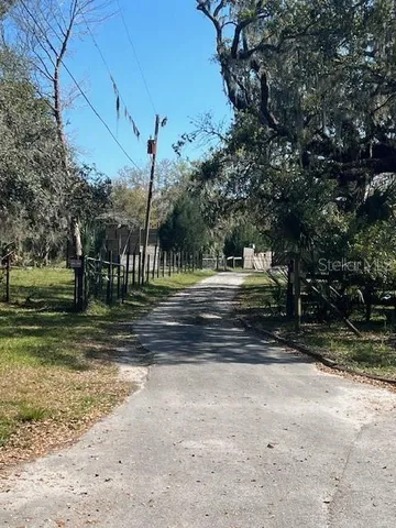 a view of street along with trees