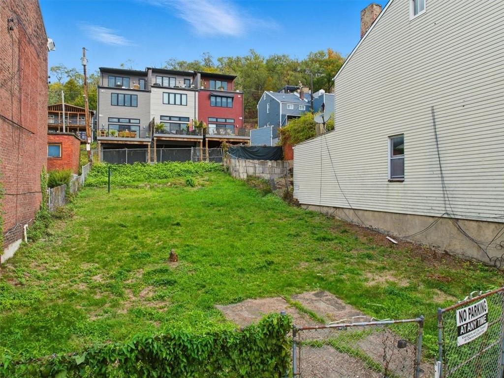 518-520 Armandale Street Pittsburgh, PA 15212 - Photo 9 of 16 a backyard of a house with lots of green space