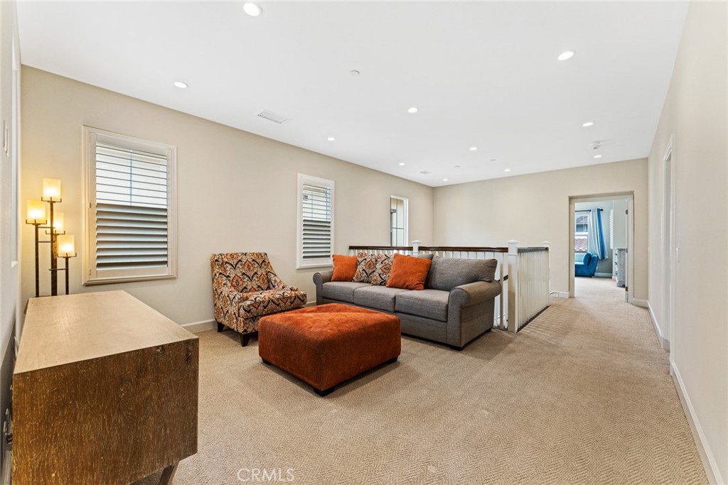 126 Baja Irvine, CA 92620 - Photo 17 of 30 a living room with furniture and a window