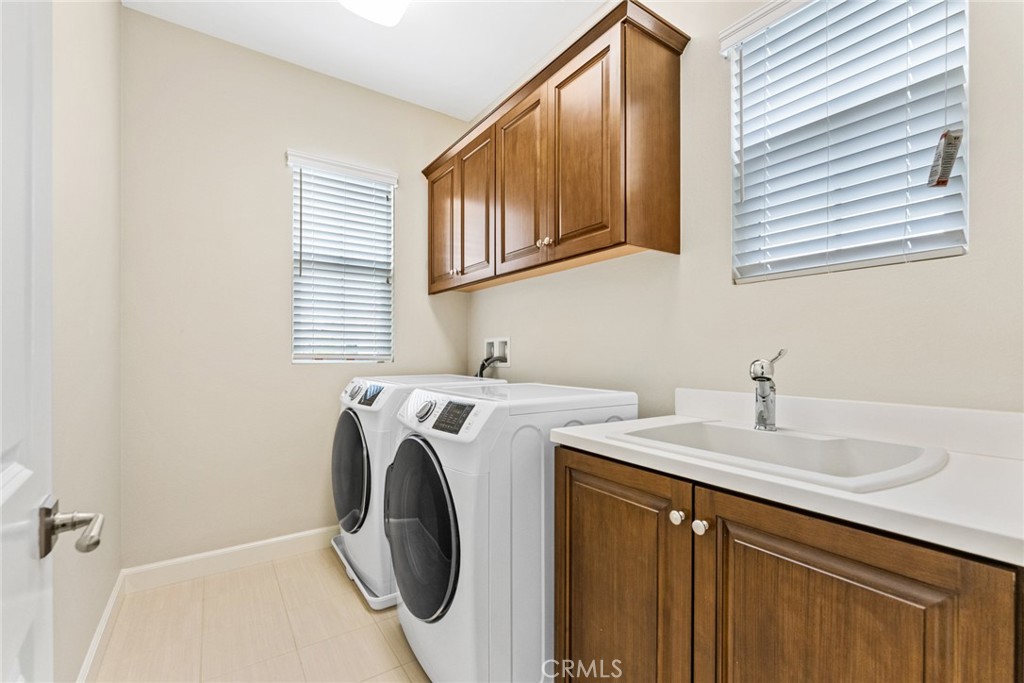 126 Baja Irvine, CA 92620 - Photo 18 of 30 a utility room with dryer and washer