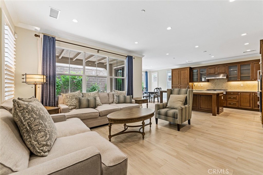126 Baja Irvine, CA 92620 - Photo 2 of 30 a living room with furniture and a large window