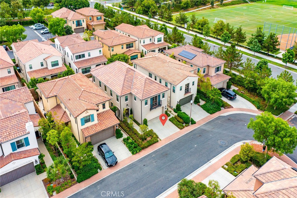 126 Baja Irvine, CA 92620 - Photo 26 of 30 an aerial view of residential houses with outdoor space