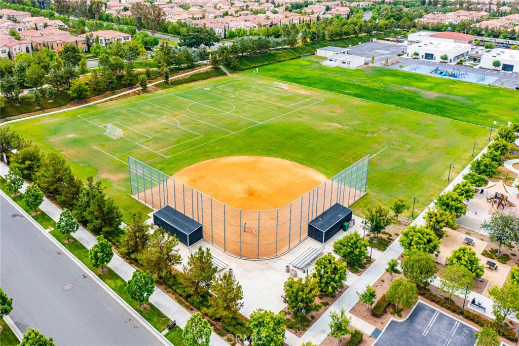 126 Baja Irvine, CA 92620 - Photo 30 of 30 a view of a swimming pool with an outdoor space and seating area
