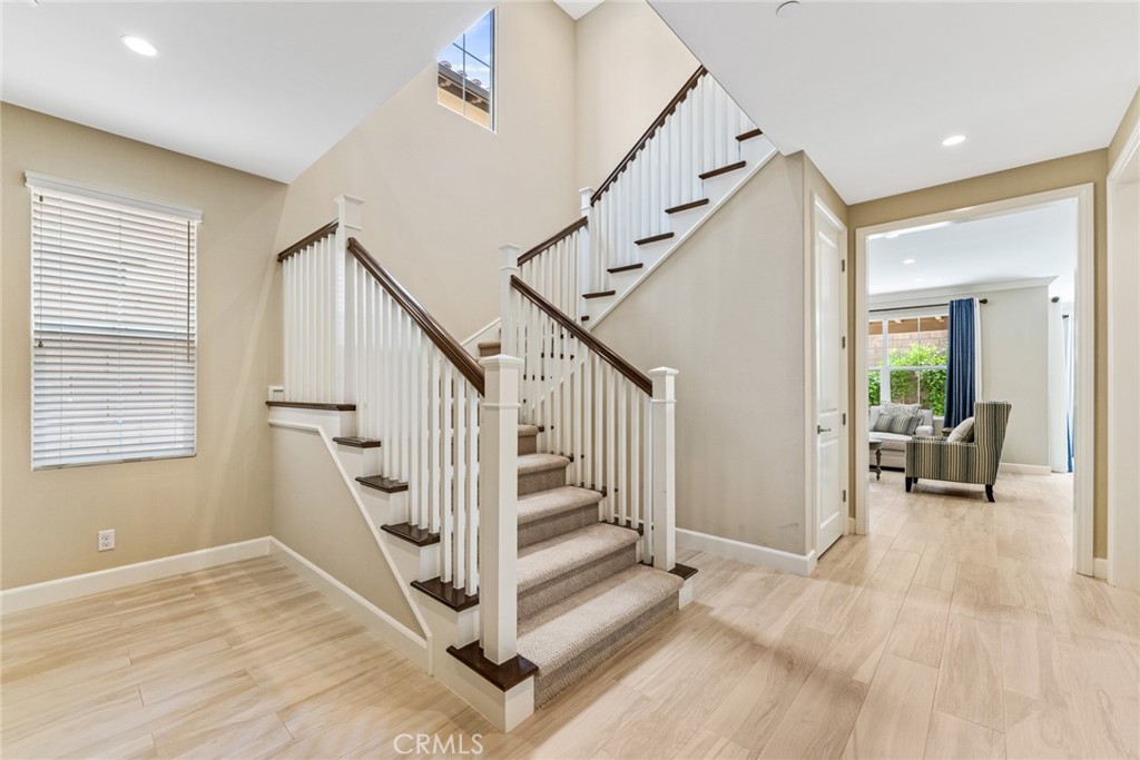 126 Baja Irvine, CA 92620 - Photo 8 of 30 a view of entryway and hall with wooden floor