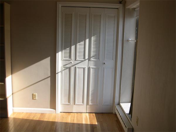 247 Washington, Unit 9 Winthrop, MA 02152 - Photo 11 of 19 a view of wooden door