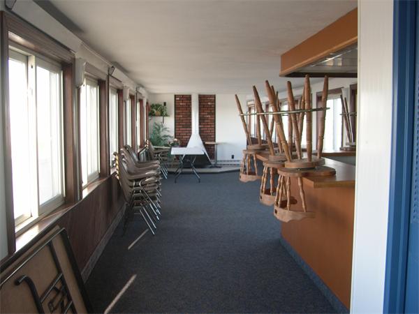247 Washington, Unit 9 Winthrop, MA 02152 - Photo 17 of 19 a view of a patio with table and chairs