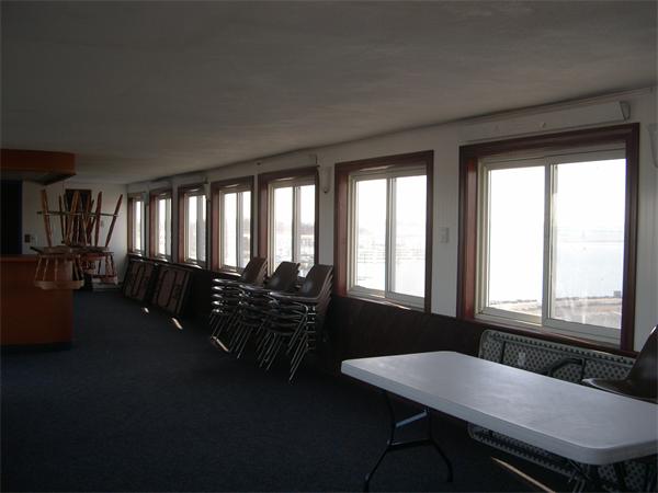 247 Washington, Unit 9 Winthrop, MA 02152 - Photo 18 of 19 a dinning room with furniture and wooden floor