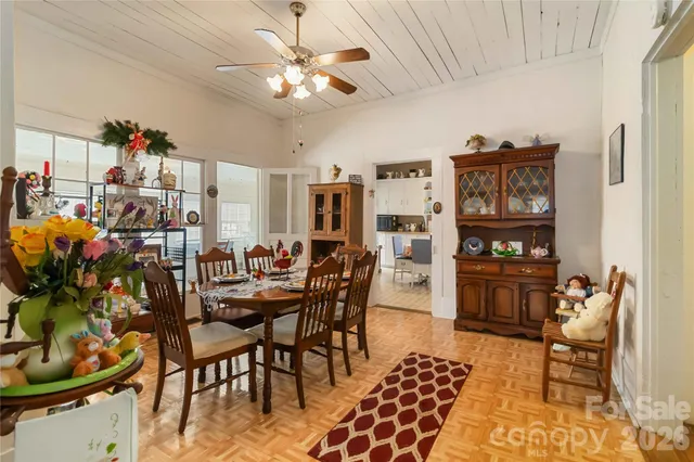 a view of a dining room with furniture