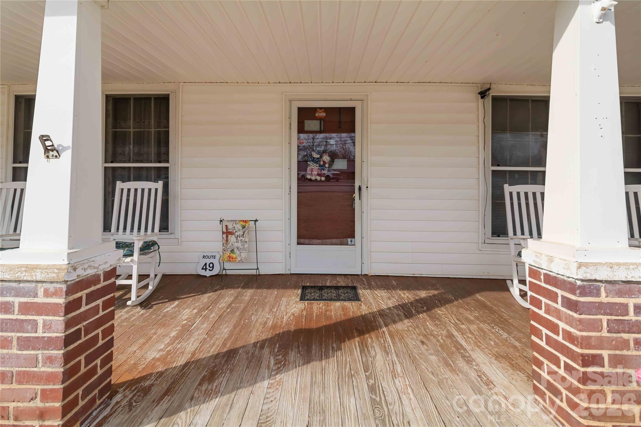 3841 York Street Sharon, SC 29742 - Photo 2 of 31 a view of an empty room with stairs and a window