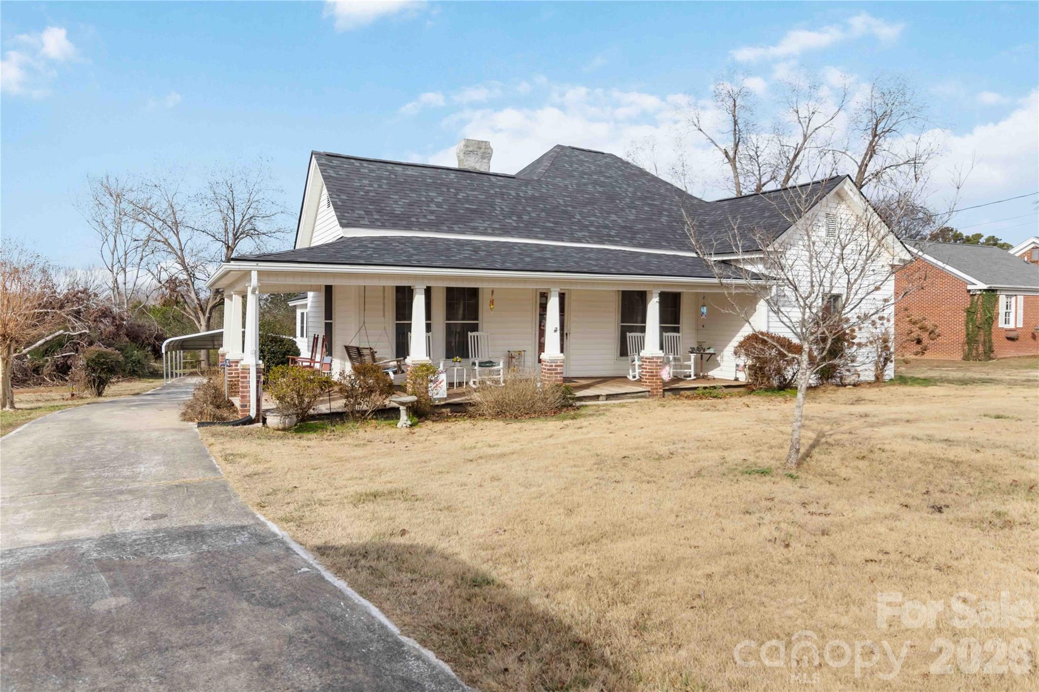 3841 York Street Sharon, SC 29742 - Photo 27 of 31 a view of a house with a yard covered in snow