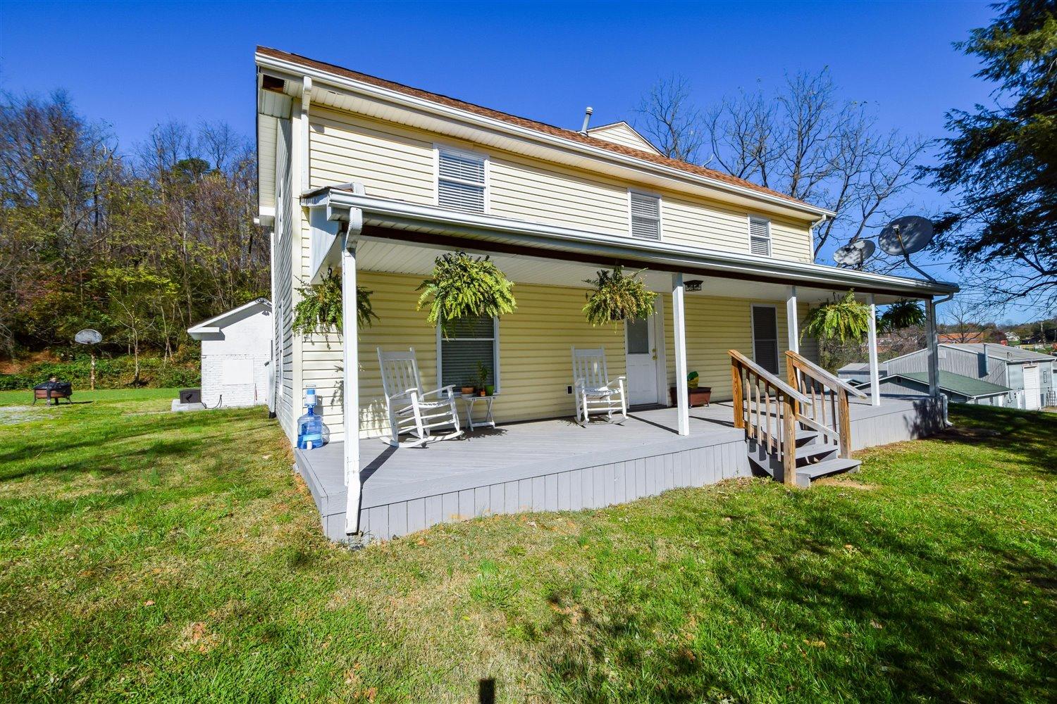 2677 Webster Road Blue Ridge, VA 24064 - Photo 1 of 35 a view of a house with backyard porch and sitting area