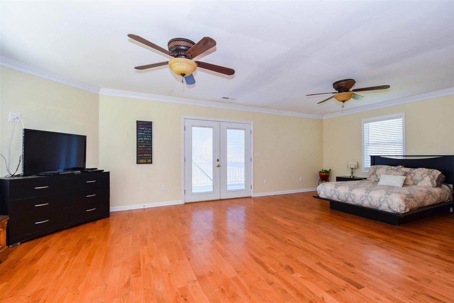 2677 Webster Road Blue Ridge, VA 24064 - Photo 13 of 35 a living room with furniture and a flat screen tv