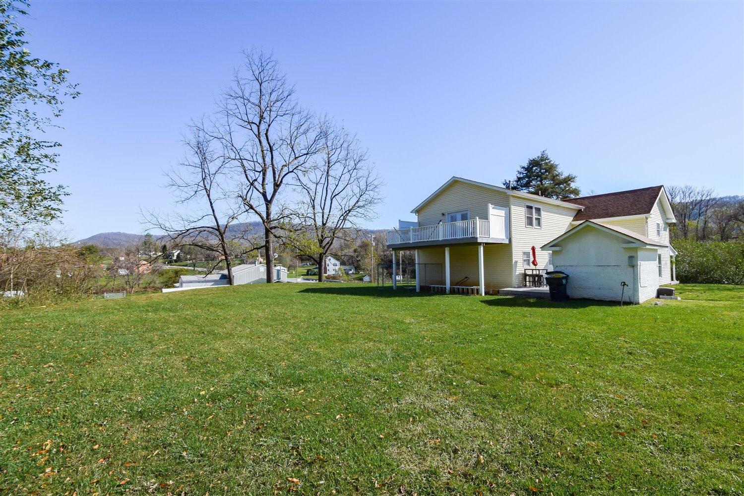 2677 Webster Road Blue Ridge, VA 24064 - Photo 23 of 35 a front view of house with yard and green space