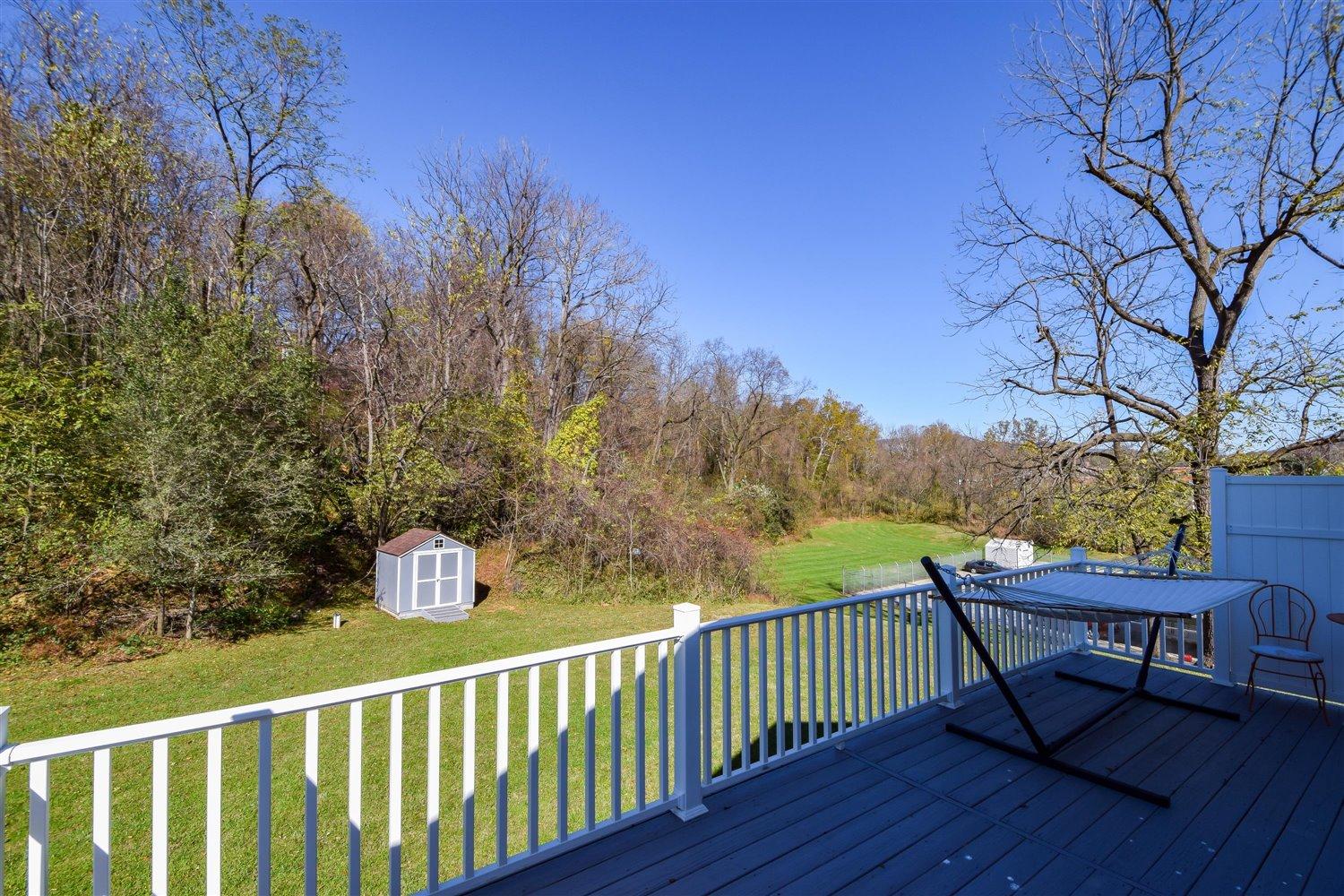 2677 Webster Road Blue Ridge, VA 24064 - Photo 33 of 35 a view of a wooden deck with trees in the background
