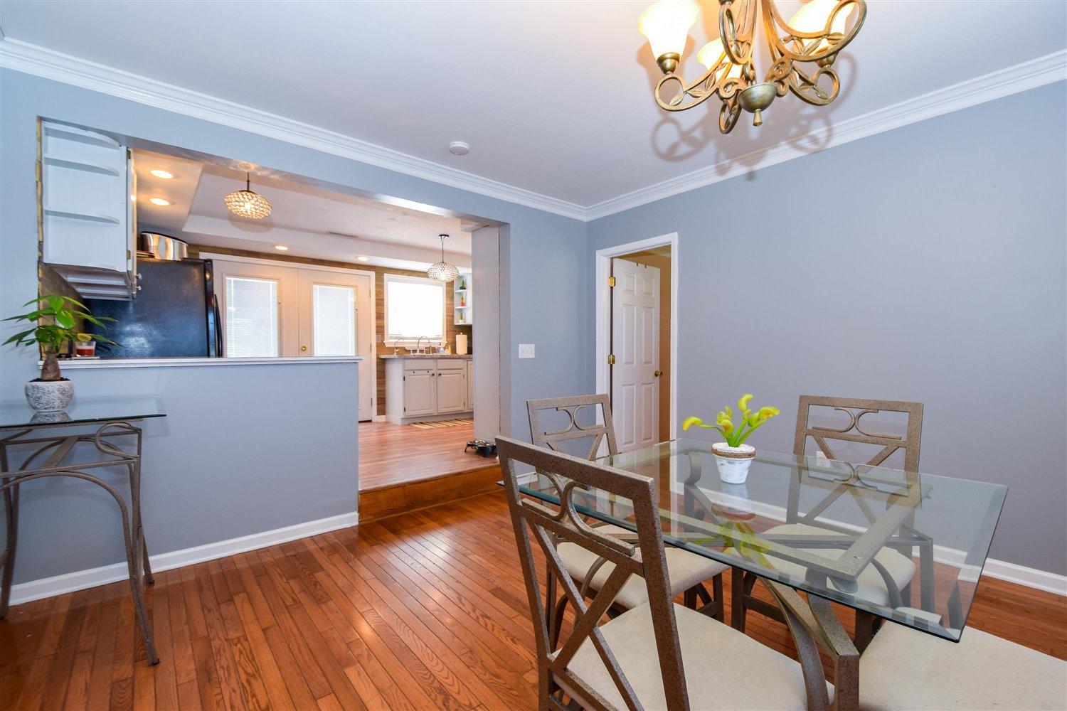 2677 Webster Road Blue Ridge, VA 24064 - Photo 6 of 35 a dining room with furniture and wooden floor