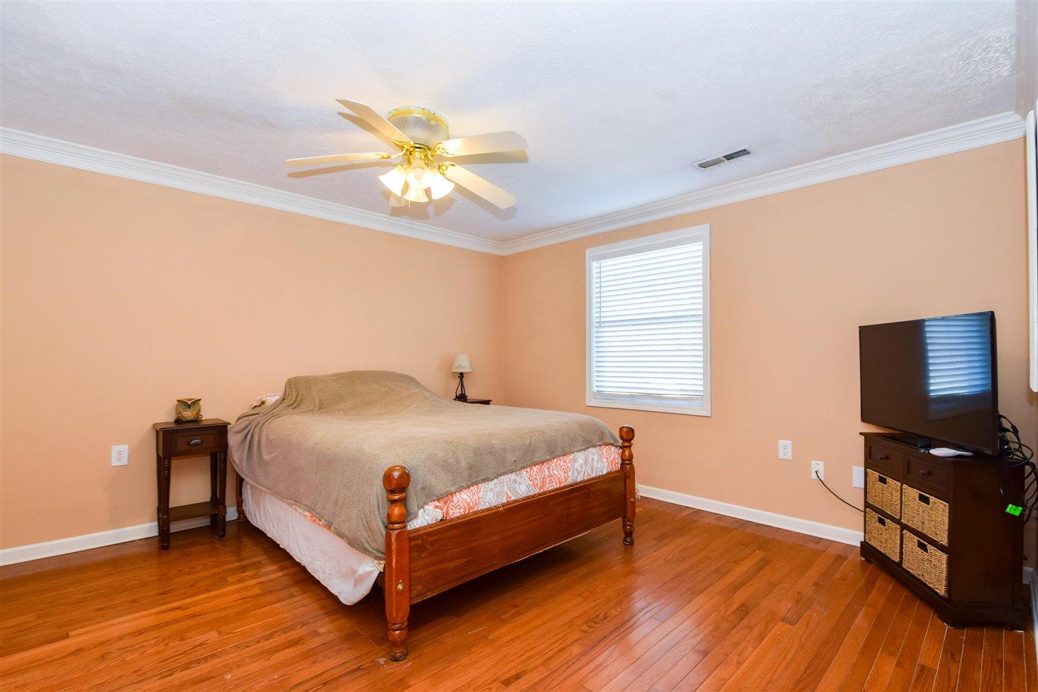 2677 Webster Road Blue Ridge, VA 24064 - Photo 9 of 35 a bedroom with a bed and a flat screen tv
