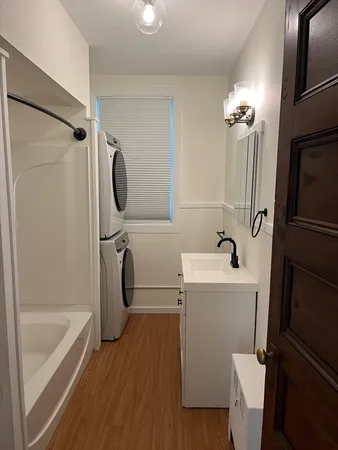 a bathroom with a sink a toilet and a bathtub