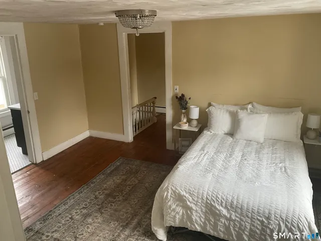 a view of entryway with a front door