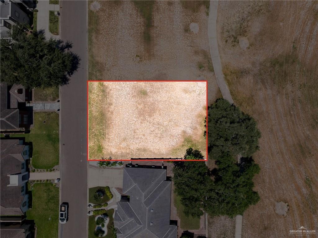 2109 Pecos Street Mission, TX 78572 - Photo 2 of 7 an aerial view of residential house with outdoor space and trees around