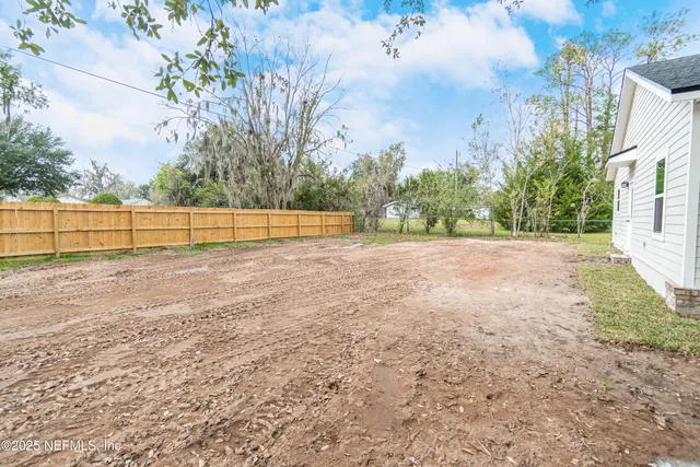 a view of an outdoor space and a yard